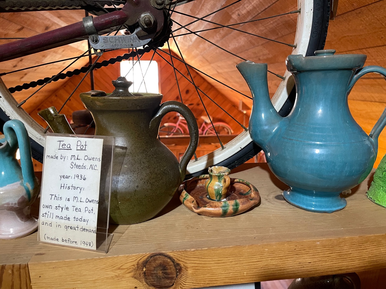 M.L. Owens teapots in shop display