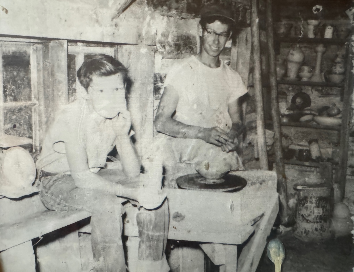 Vernon Owens and Boyd Owens as young men at the pottery wheel
